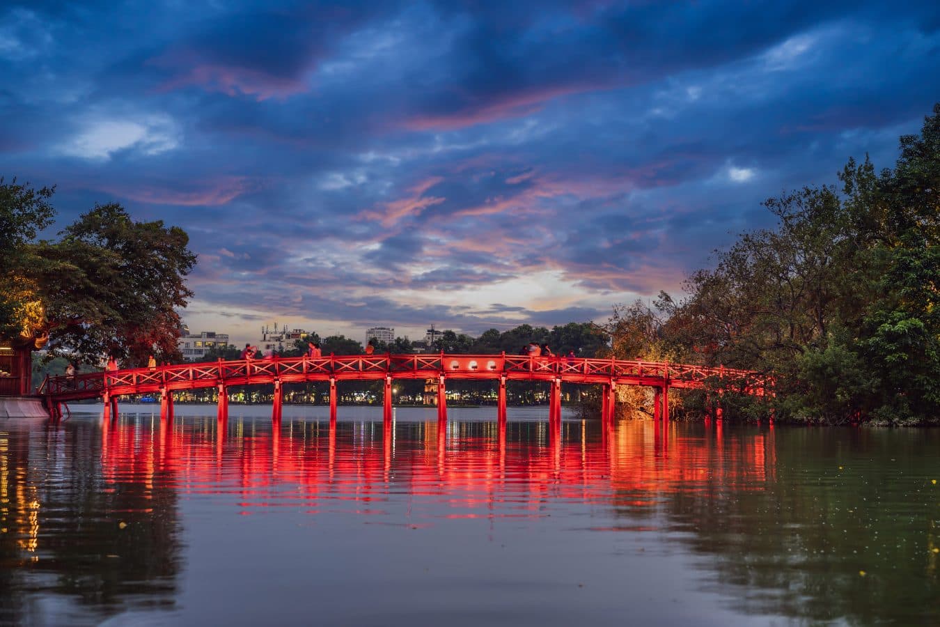 The Huc Bridge over Hoan Kiem Lake at twilight, Hanoi, Vietnam