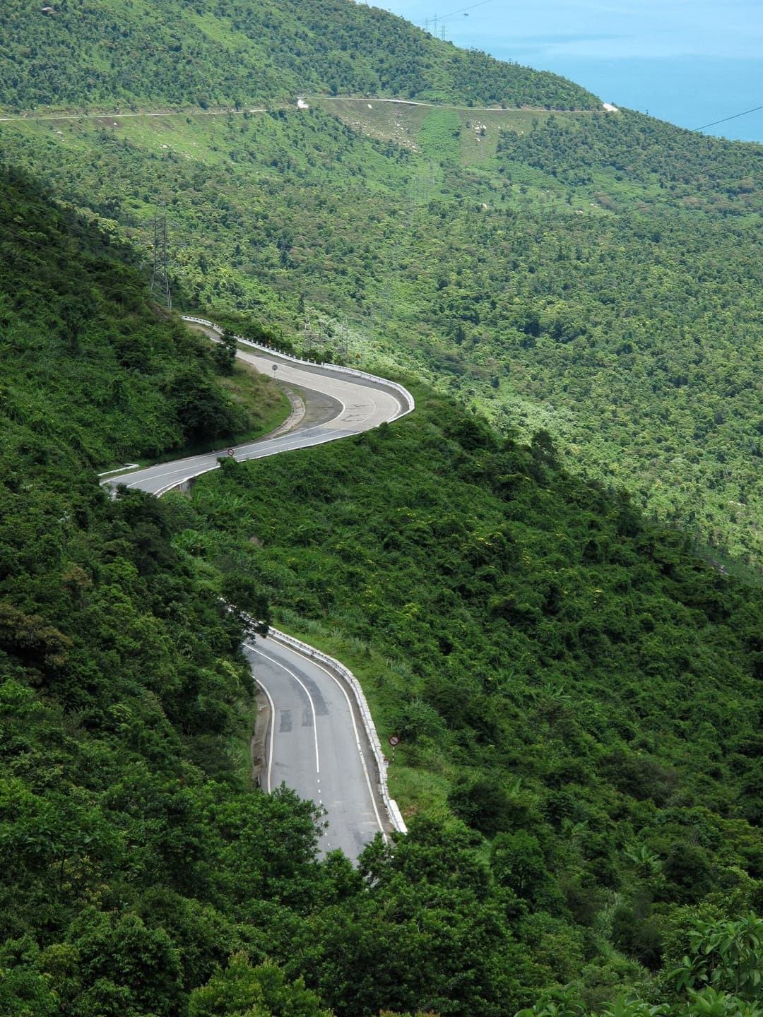The Hai Van Pass coast road near Da Nang, at its best in the central dry season.