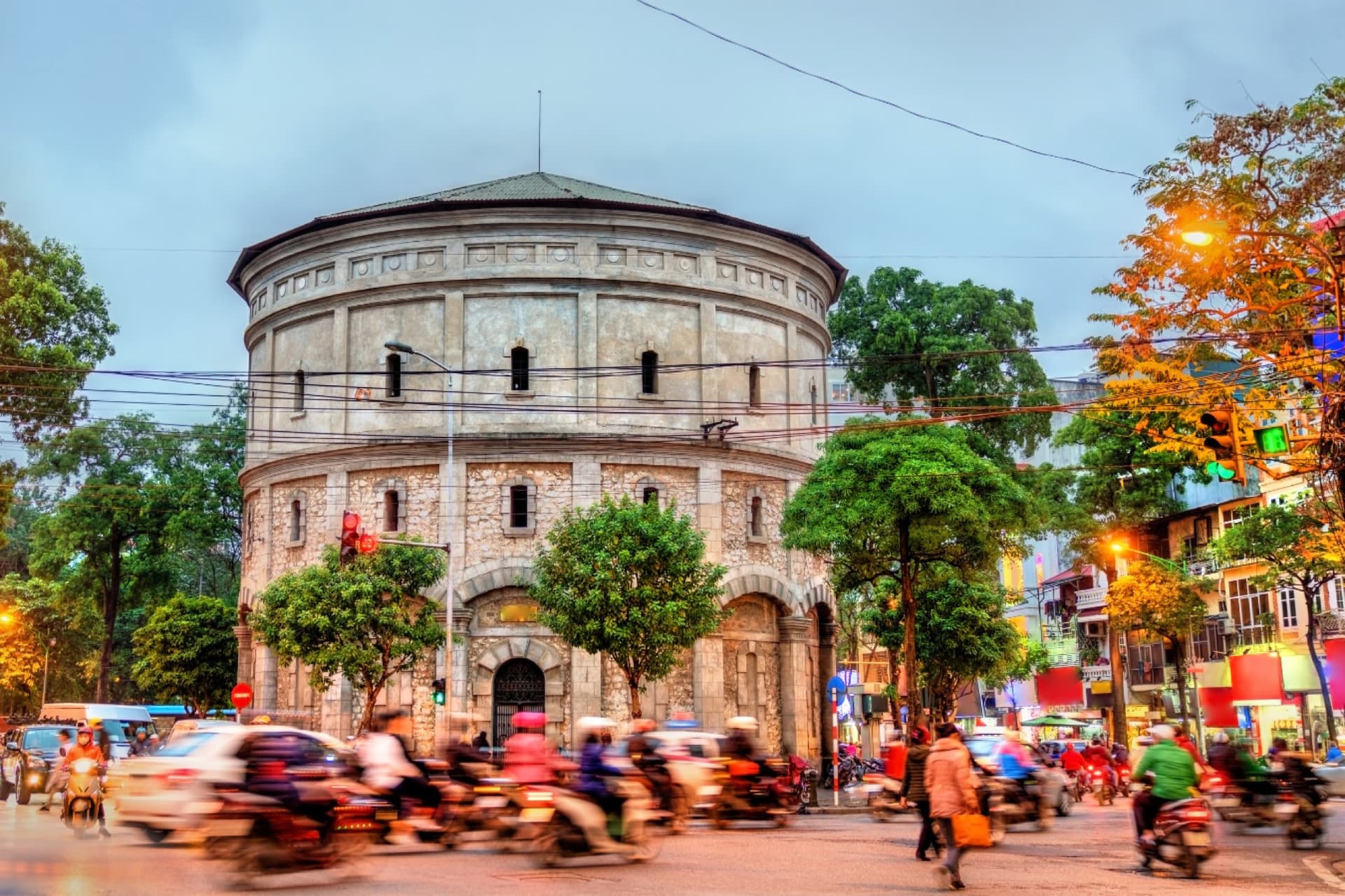 The Hang Dau water tower on a busy roundabout in central Hanoi, now reachable nonstop from Amsterdam on Vietnam Airlines. Two direct doors into Southeast Asia from one European hub.