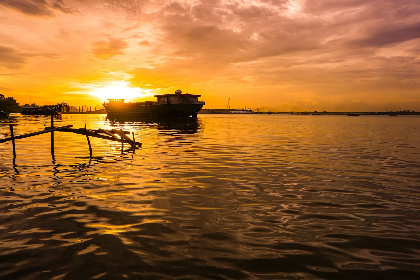 Golden hour on the Mekong, the frontier river that threads the far north.