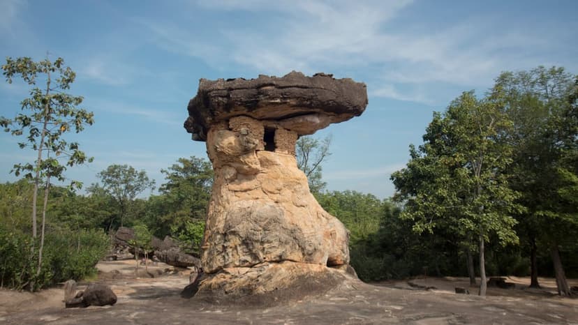 A mushroom-capped sandstone tower at Phu Phra Bat, the Udon Thani rock-shelter landscape inscribed by UNESCO in 2024.