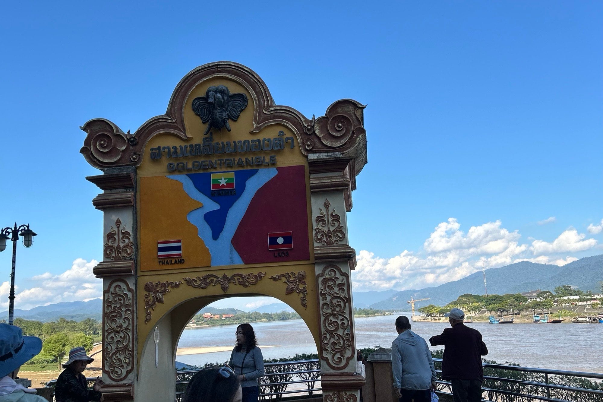 The Golden Triangle marker at Sop Ruak, looking out over the Mekong where Thailand, Laos, and Myanmar meet.