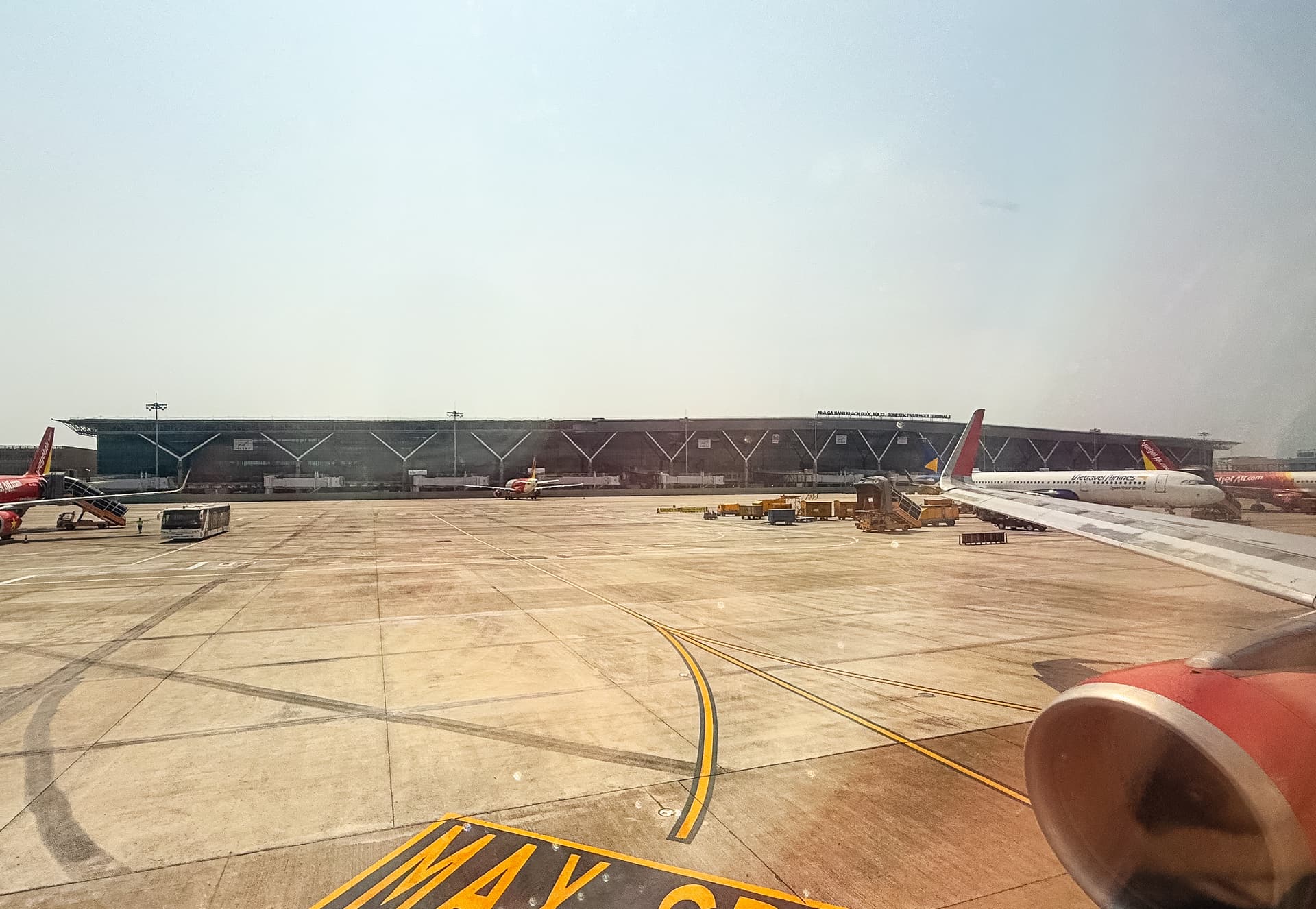 The apron at Tan Son Nhat International Airport in Ho Chi Minh City, with Vietnamese carriers on stand. Most European arrivals now clear entry on either a 45-day exemption or a 90-day e-visa.