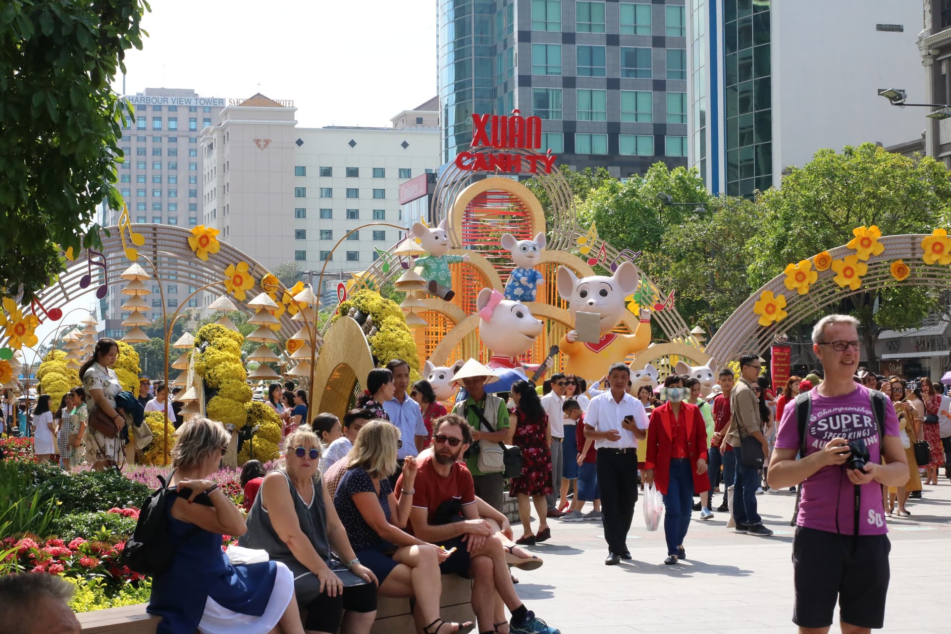 Visitors walking through a previous Tet flower festival on Nguyen Hue Street in Ho Chi Minh City.
