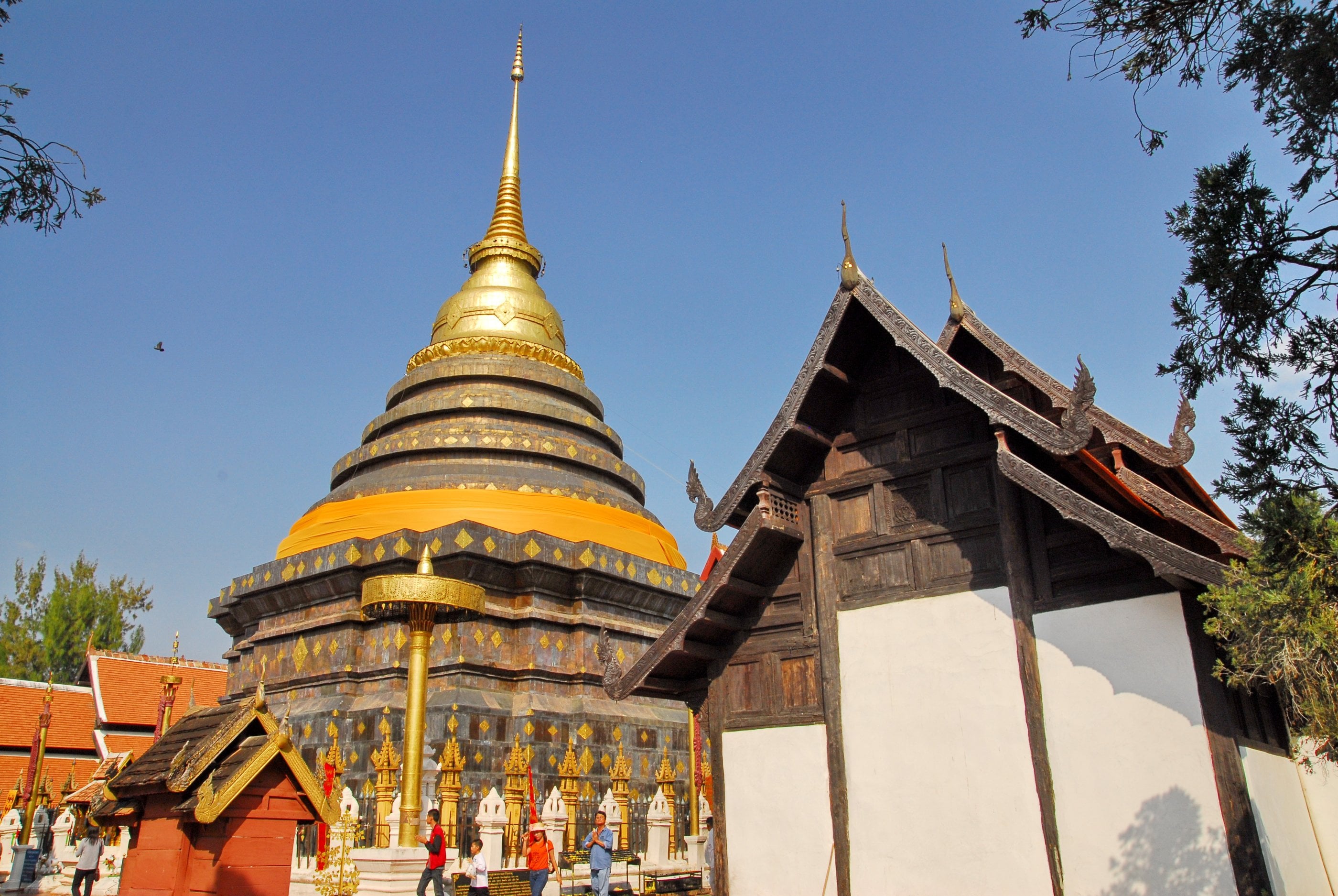 Wat Phra That Lampang Luang, one of the finest surviving Lanna temple compounds, its copper-and-bronze-clad chedi dating to 1449.
