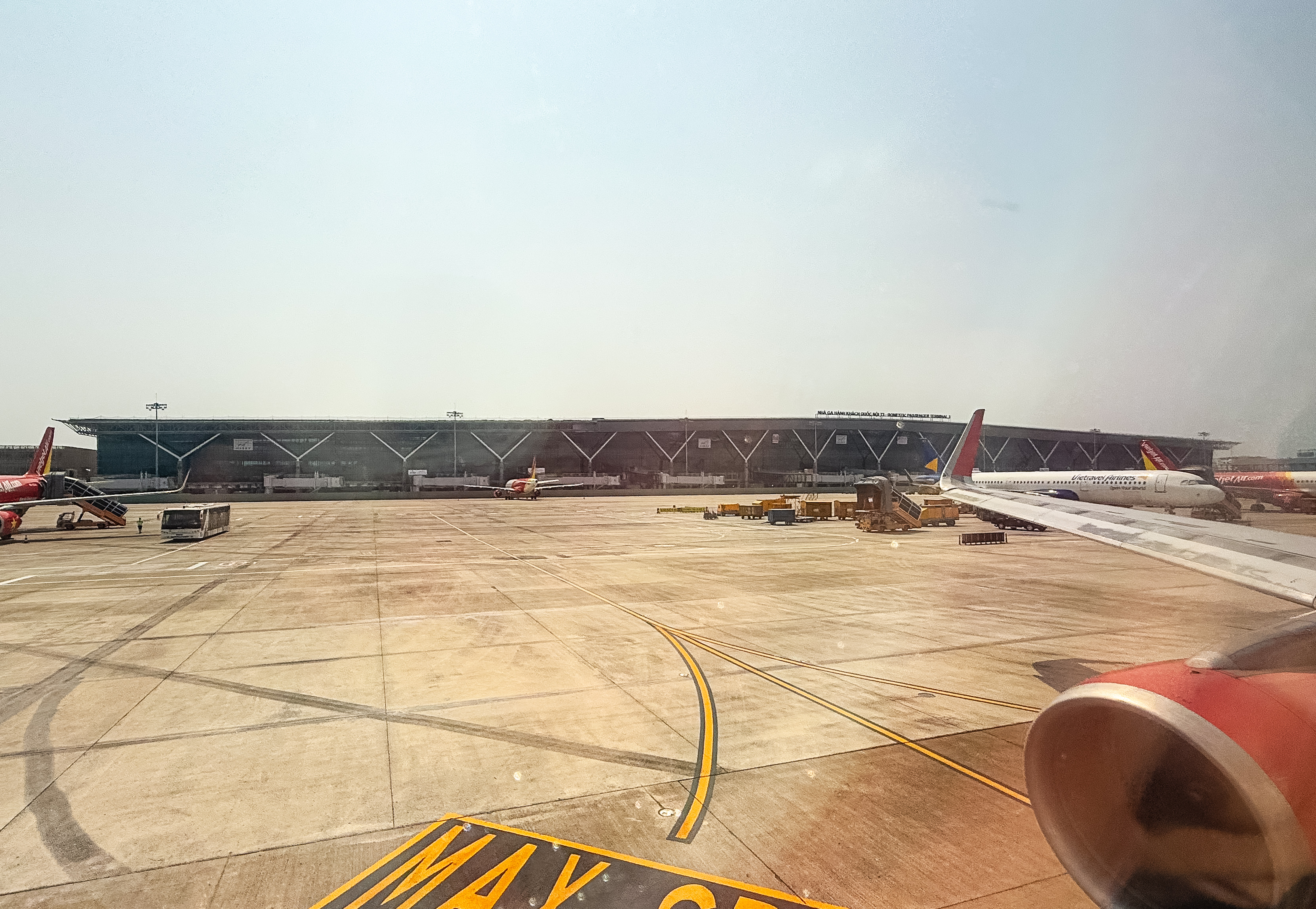 The apron at Tan Son Nhat International Airport in Ho Chi Minh City, with Vietnamese carriers on stand. Most European arrivals now clear entry on either a 45-day exemption or a 90-day e-visa.